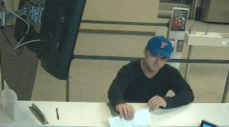 This man, identified by police as 24-year-old Quinton Boast, has been charged in connection with three bank robberies. (Credit: Sandy Springs Police Department)