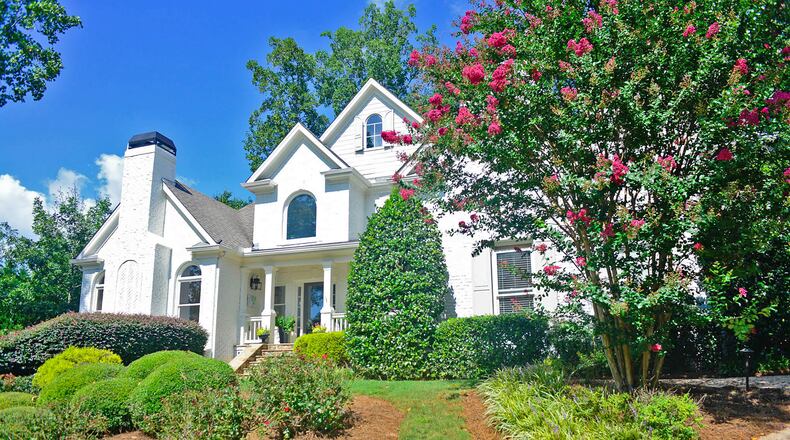 When Edee, who owns Stephanie Leigh Designs, bought her home six years after it was built in 2010, she gave the grayish brick a fresh coat of white paint.
