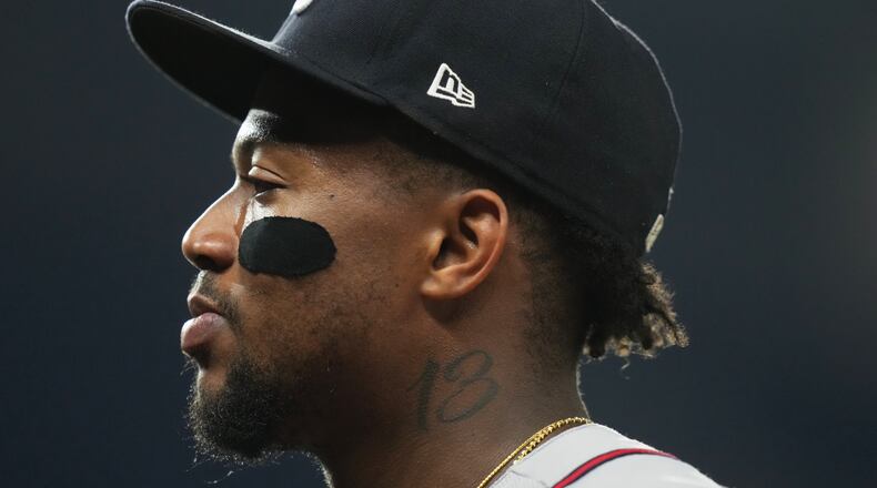 Atlanta Braves right fielder Ronald Acuña walks to the dugout during the fourth inning of a baseball game against the Miami Marlins, Thursday, May 21, 2026, in Miami. (Lynne Sladky/AP)