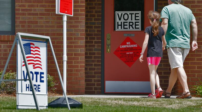 May 20, 2014 - Cobb county - A steady flow of voters entered the polling place at Beautiful Savior Lutheran Church on Shallowford Rd. in Marietta. BOB ANDRES / BANDRES@AJC.COM A polling place in Cobb County last year (AJC/Bob Andres)