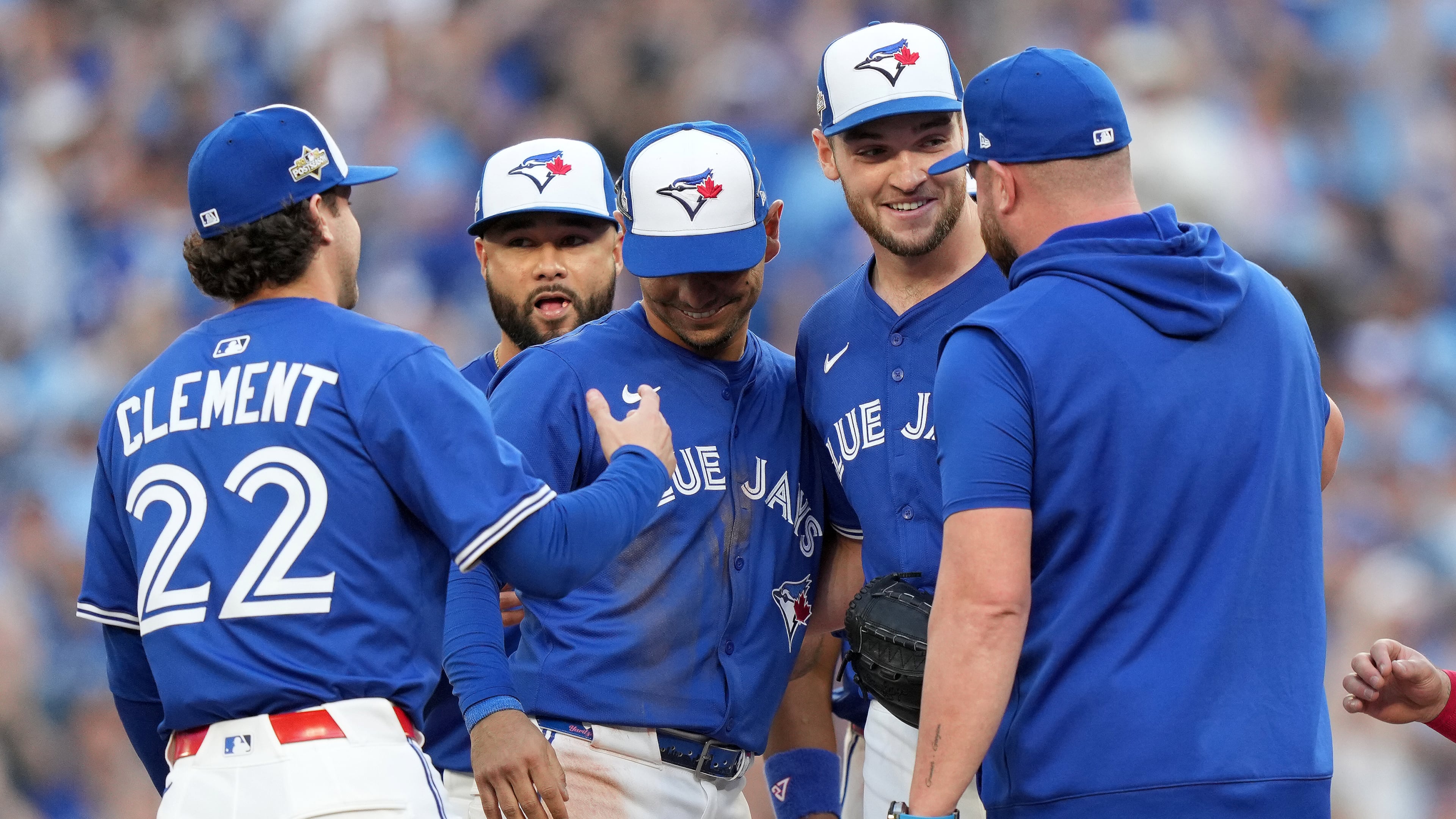 Toronto Blue Jays pitcher Trey Yesavage, second from right, celebrates with teammates after being pulled from the mound by manager John Schneider, right, during the sixth inning of Game 2 of baseball's American League Division Series against the New York Yankees in Toronto, Sunday, Oct. 5, 2025. (Nathan Denette/The Canadian Press via AP)