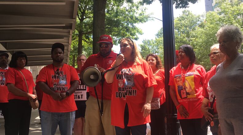 Democrat Sarah Riggs Amico joined a picket line outside an AT&T building in Midtown Atlanta last week for her first public event since launching her campaign for the U.S. Senate. AJC/file