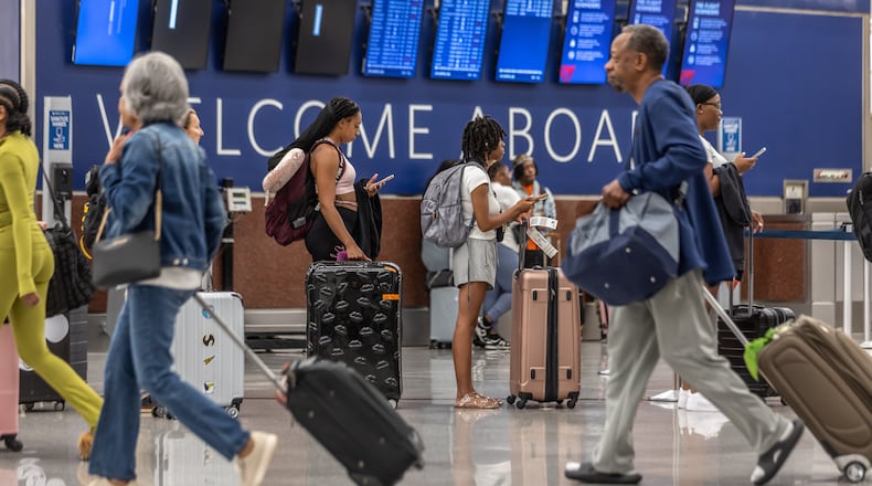 Travelers at Delta ticket counters at Hartsfield-Jackson International Airport on Friday, July 19, 2024 as a massive CrowdStrike outage affected Microsoft users around the globe. (John Spink/AJC)