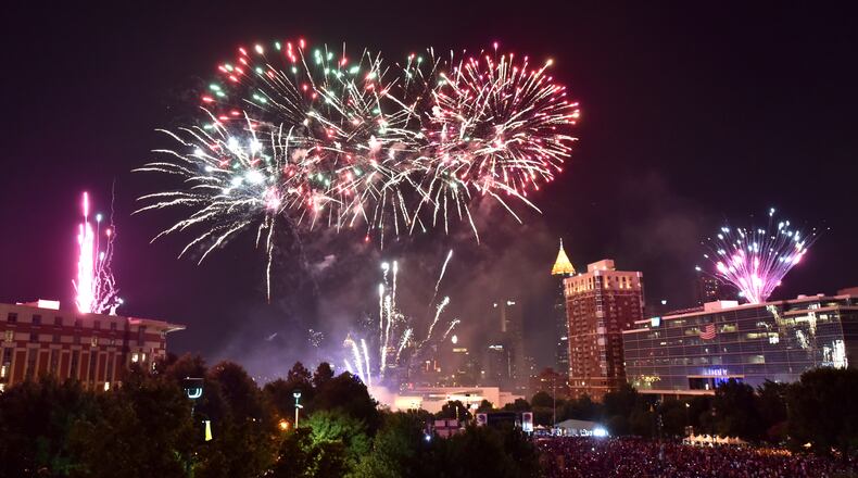 July 4, 2016 Atlanta - The finale fireworks spectacular light up over the Downtown skyline during Centennial Olympic Park's Fourth of July Celebration on Monday, July 4, 2016. HYOSUB SHIN / HSHIN@AJC.COM