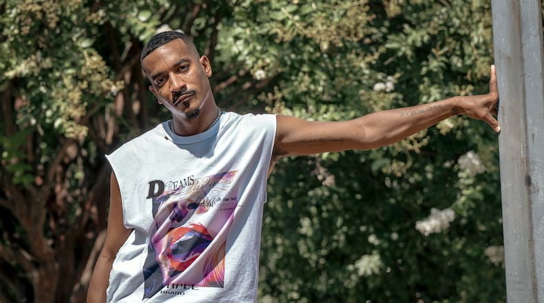 Dancer and choreographer Sean Bankhead poses outside of now-closed Dance 411 Studios in Atlanta on Friday, August 9, 2024. (Ronald R. Williams III/AJC)