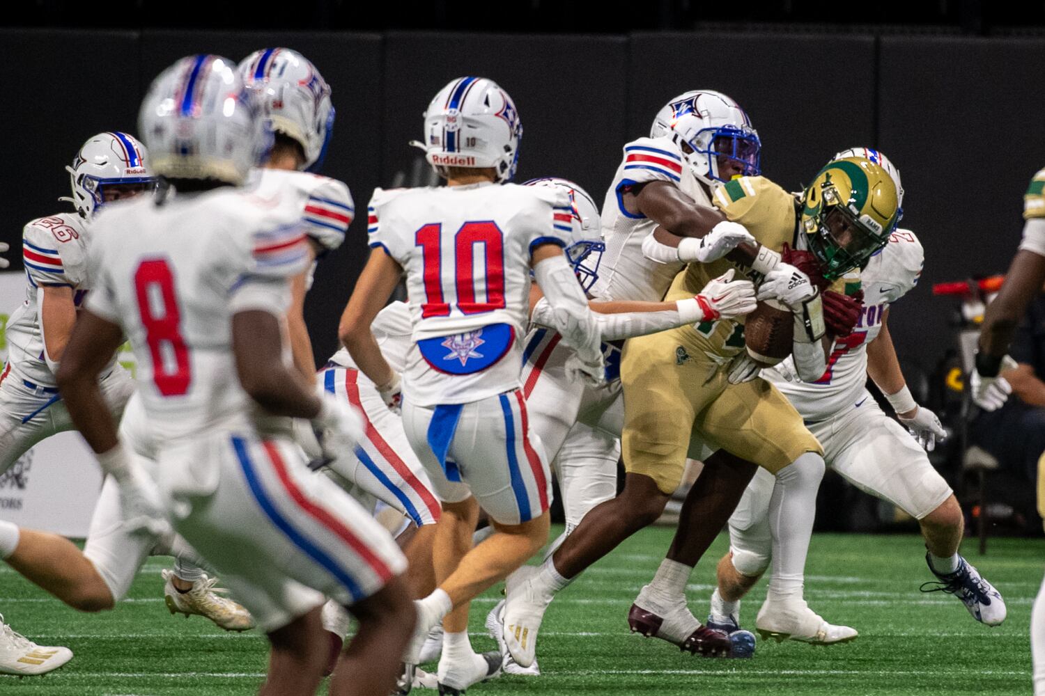 Amari Alston is stopped by Walton during the Corky Kell and Dave Hunter Classic on August 19, 2023. (Jamie Spaar for the Atlanta Journal Constitution)