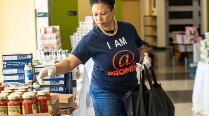 The Atlanta Hawks through the Hawks Foundation and State Farm are providing support to Goodr in collaboration with the City of Atlanta Department of Parks and Recreation to deliver food and supplies to seniors at their homes, senior centers or at pop-up locations throughout the city. Last Friday, more than 500 families were served in three hours at the At-Promise Youth Center. COURTESY OF THE HAWKS FOUNDATION