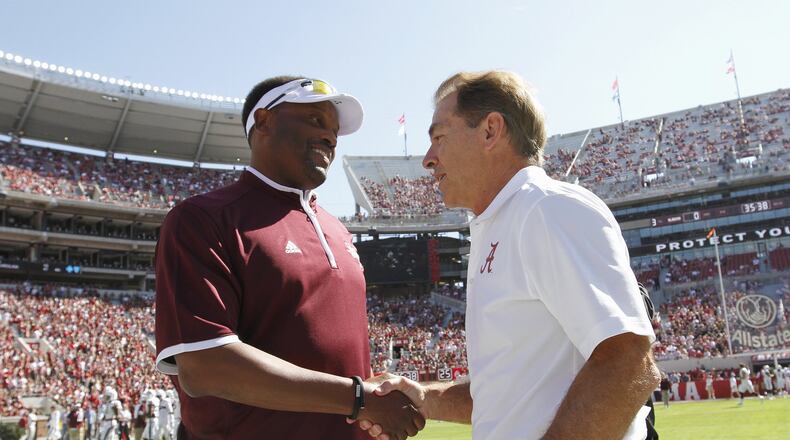 Texas A&M coach Kevin Sumlin (left) and Alabama coach Nick Saban have their teams in the top four of this week’s College Football Playoff rankings. Alabama is ranked No. 1 and A&M No. 4. (AP Photo/Butch Dill, File)