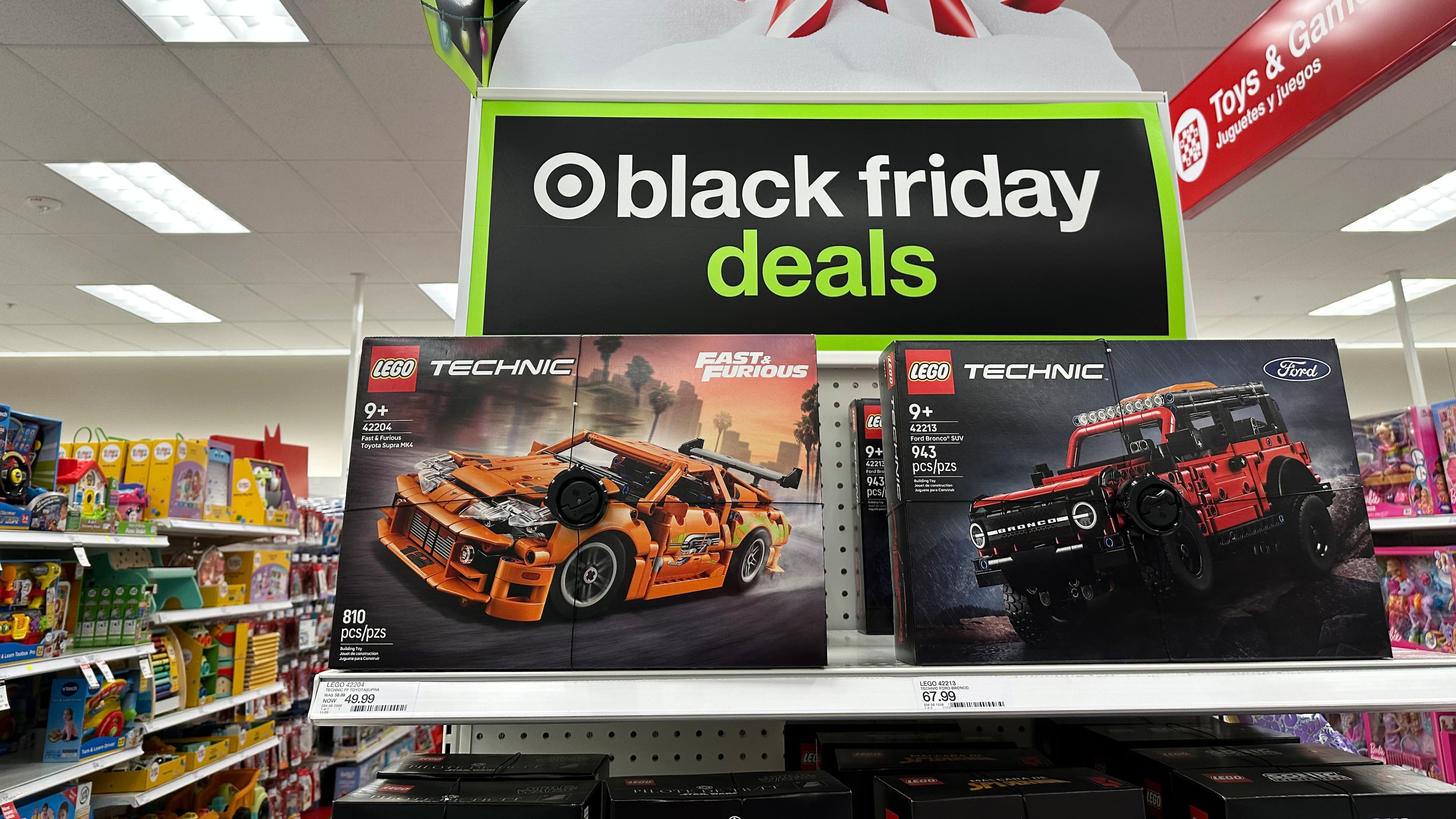 Sign marks special prices on toys as retailers roll out Black Friday deals, Wednesday, Nov. 26, 2025, in a Target store in southeast Denver. (AP Photo/David Zalubowski)