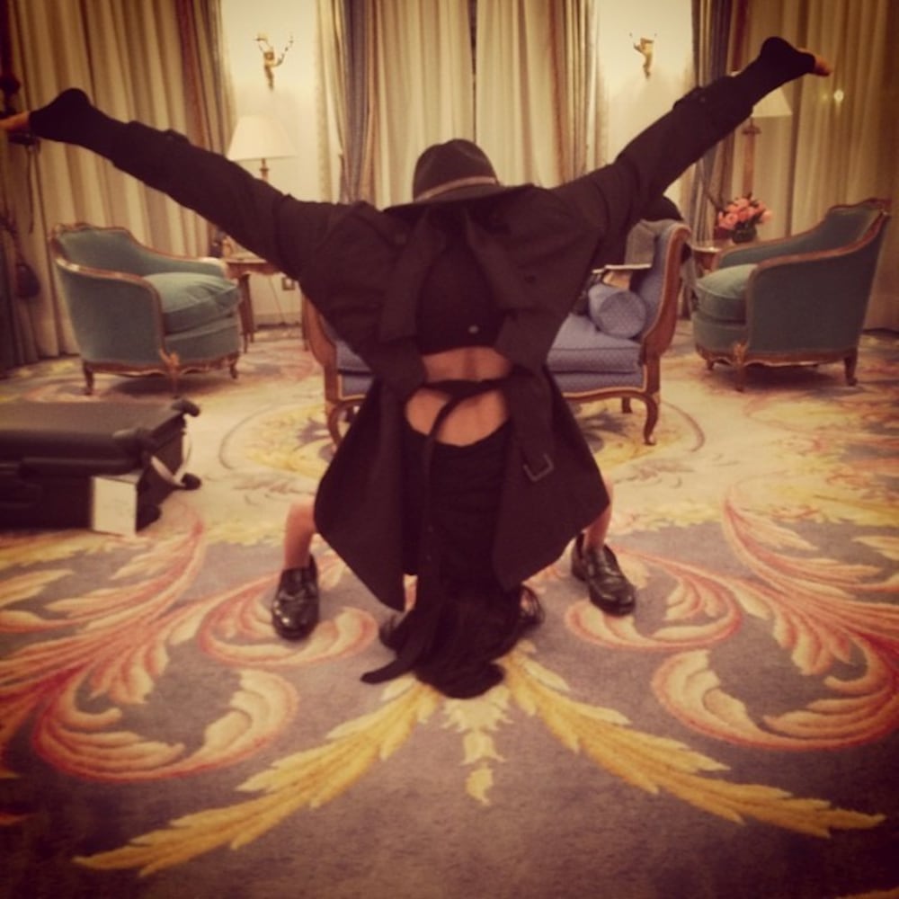 Feb. 15, 2014: ...sometimes my #yogapostureoftheday isn't a success #hilariaypd upside down headstand man seemed like a good idea-at least Carmen thought it was hilarious