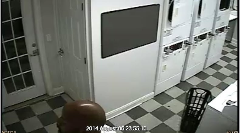 Fire investigators suspect this man is responsible for a pair of fires at a Lawrenceville apartments complet