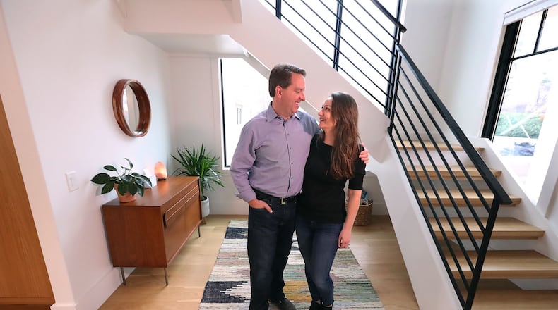 Matt Paxton, a former expert on “Hoarders,” and minimalist expert Zoe Kim show off their minimalist modern farm-style home on Monday, Jan. 25, 2021, in Suwanee. Paxton has started his own PBS show “Legacy List,” which focuses on items people keep because they carry important stories. Curtis Compton / Curtis.Compton@ajc.com”