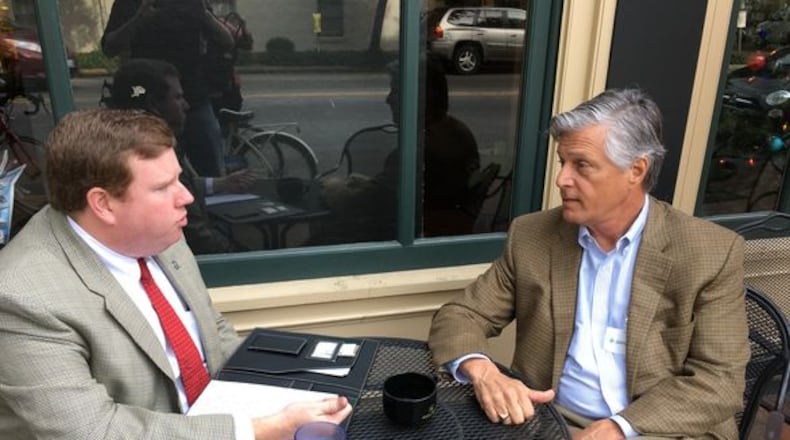 Savannah Mayor Eddie DeLoach, right, talks with his chief of staff Martin Sullivan. He’s a top Democratic target in the Dec. 3 runoff. AJC Photo/Greg Bluestein