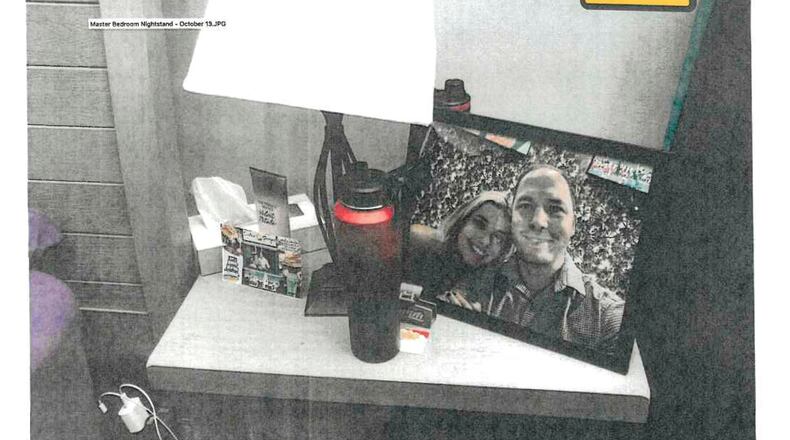 FILE - This image provided by the Fairfax County Police Department and taken on Oct. 13, 2023, was submitted as evidence in the murder case against Brendan Banfield shows a framed photo of Banfield and Juliana Peres Magalhães on his bedside table in Herndon, Va. (Fairfax County Police Department via AP, File)