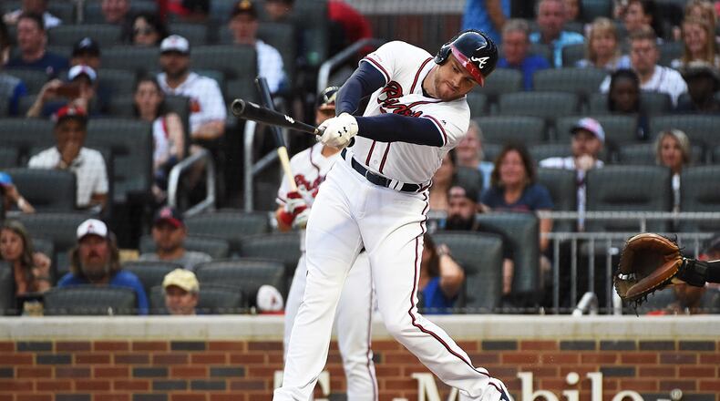 Freddie Freeman of the Braves takes a swing. (Photo by Logan Riely/Getty Images)