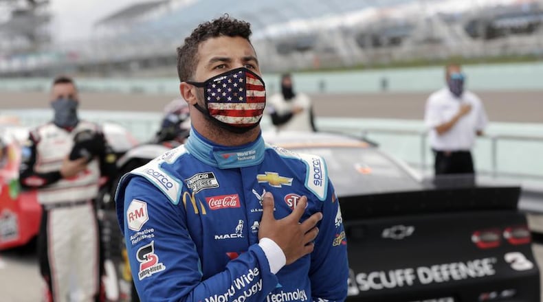 Bubba Wallace stands for the national anthem before a NASCAR Cup Series auto race in June in Florida. AP file photo