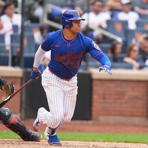 New York Mets' Juan Soto looks after his two-run single during the eighth inning of a baseball game against the Atlanta Braves, Sunday, June 14, 2026, in New York. (AP Photo/Seth Wenig)