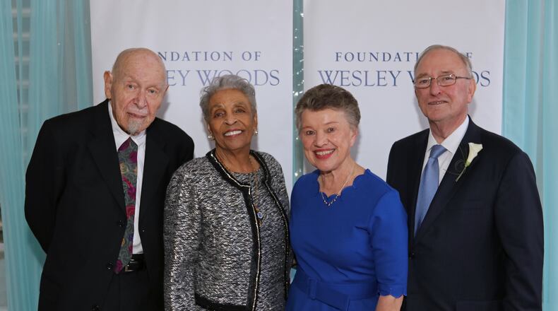 Bishop John Adams and Dr. Dolly Desselle Adams, from left, Ann Q. Curry and Chancellor Hank Huckaby were honored at this year's Heroes, Saints and Legends fundraiser. Photo: Kim Link