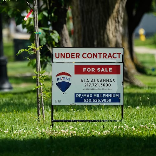 A under contract for home sale sign is seen outside of a home in Niles, Ill., Thursday, June 25, 2026. (AP Photo/Nam Y. Huh)