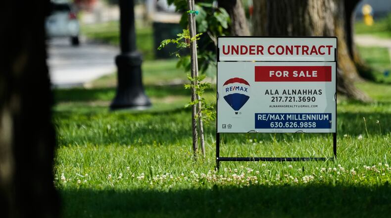 A under contract for home sale sign is seen outside of a home in Niles, Ill., Thursday, June 25, 2026. (AP Photo/Nam Y. Huh)