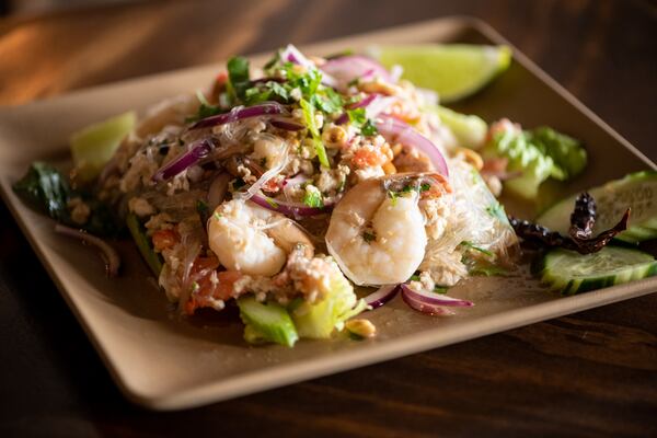 Rickshaw Thai Street Food Yum Woon Sen, clear noodles mixed with ground chicken and shrimp in red onions, scallions, tomatoes, celery, peanuts and chile lime dressing. (Mia Yakel for The Atlanta Journal-Constitution)