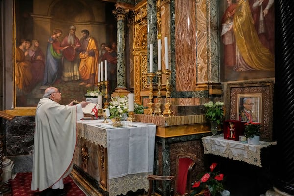 Augustinian friar Paolo Angelone celebrates Mass in the Sanctuary of Our Mother of Good Counsel in Genazzano, Italy, Thursday, May 15, 2025. (AP Photo/Gregorio Borgia)