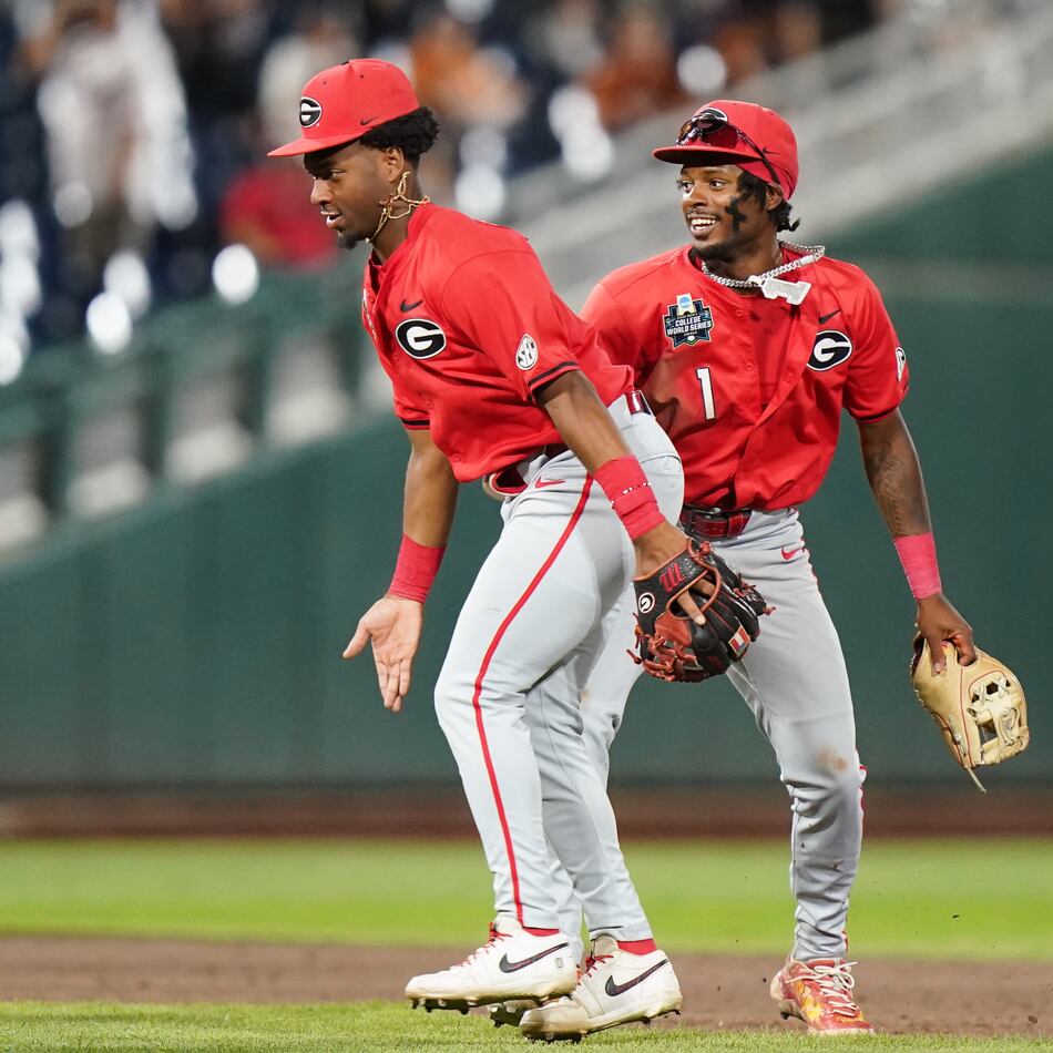 Georgia teammates celebrate after an NCAA baseball College World Series elimination game against Texas, Tuesday, June 16, 2026 in Omaha, Neb. Georgia won 2-0. (AP Photo/Vera Nieuwenhuis)