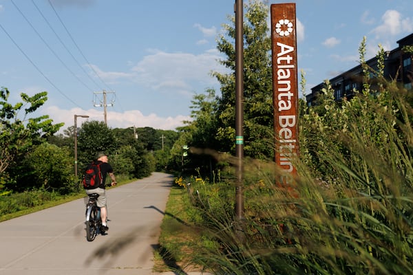 A biker rides on the Atlanta Beltline Southwest Trail, Friday, June 12, 2026. On June 12, 2026, a ribbon-cutting ceremony celebrates the completion of the longest continuous trail in the Atlanta Beltline. (Estela Muñoz/AJC)