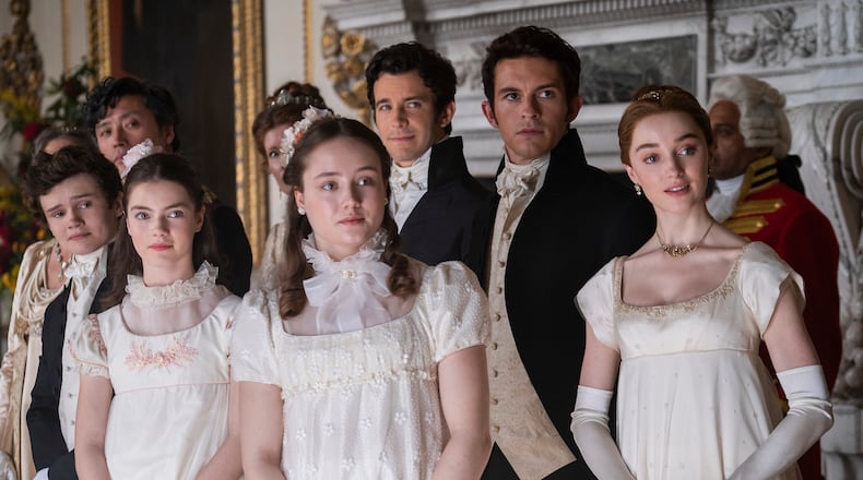 Bridgerton. (L to R) Will Tilston as Gregory Bridgerton, Florence Emilia Hunt as Hyacinth Bridgerton, Ruby Stokes as Francesca Bridgerton, Luke Thompson as Benedict Bridgerton, Jonathan Bailey as Anthony Bridgerton, Phoebe Dyvenor as Daphne Basset in episode 201 of Bridgerton. Cr. Liam Daniel/Netflix © 2022