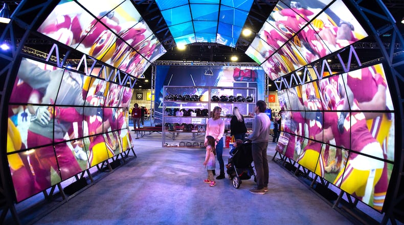 People look over one of the many displays during the Super Bowl Experience at the World Congress Center In Atlanta on Sunday, January 27, 2019. (Photo: STEVE SCHAEFER / SPECIAL TO THE AJC)