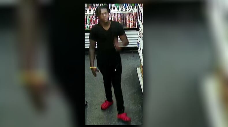 Police are looking to identify a man wanted in connection with a deadly shooting Aug. 30 outside a Vine City convenience store.