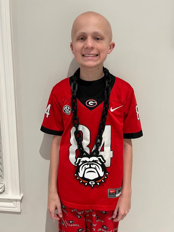 Bowie wears the chain and pendant he printed on a 3-D printer when he was hoping the UGA Bulldogs might wind up national champions this year. He's still excited to go to the game. (Courtesy of Meghan Bowie)