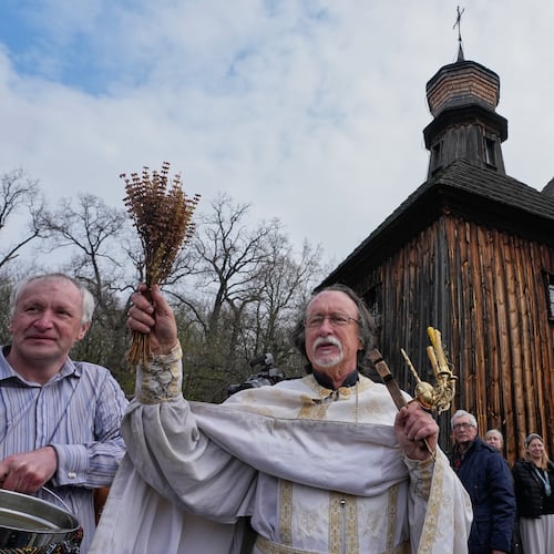 Priests bless believers and their Easter baskets to mark Orthodox Easter, in Pyrohiv, close to Kyiv, Ukraine, Sunday, April 12, 2026. (AP Photo/Efrem Lukatsky)