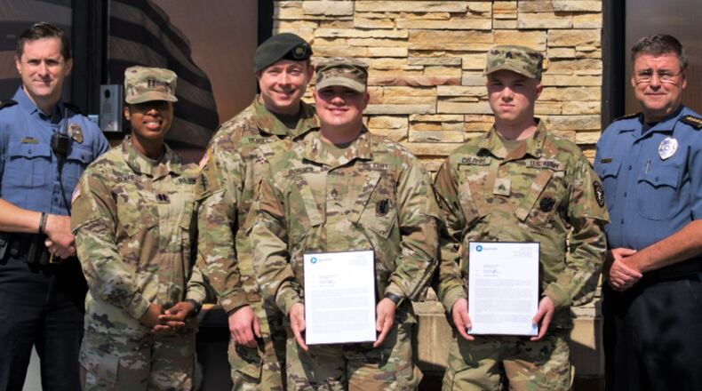 Gwinnett Police Chief Brett West recognized two recruiters, U.S. Army Sergeant Borges and Sergeant Childers, for their heroic act following a road rage incident. (Courtesy Gwinnett Police)