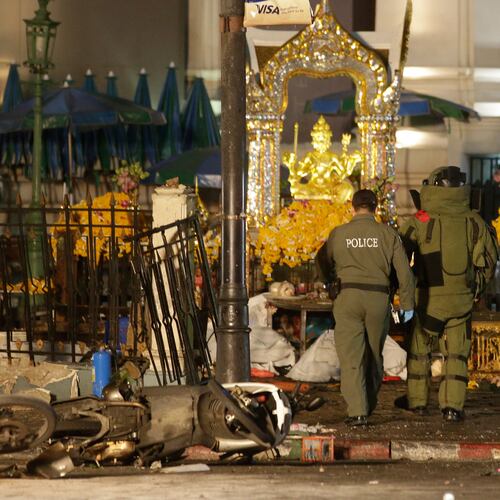 FILE - Explosive Ordnance Disposal officers enter the Erawan Shrine after an explosion in Bangkok, on Aug. 17, 2015. (AP Photo/Sackchai Lalit, File)