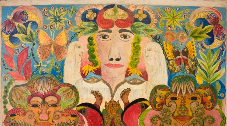 Untitled (Face Flanked by Angels and Mandalas Collage), 1946–1968, pencil, ink, crayon, and oil on paperboard, by Minnie Evans. (Courtesy of High Museum of Art)
