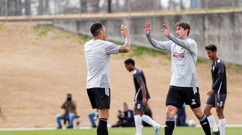 Atlanta United midfielder Alexey Miranchuk (right) celebrates after scoring a goal during the preseason match against Lexington Sporting Club at Children’s Healthcare of Atlanta Training Ground in Marietta, on Friday, January 30, 2026. (Matthew Dingle/Atlanta United)