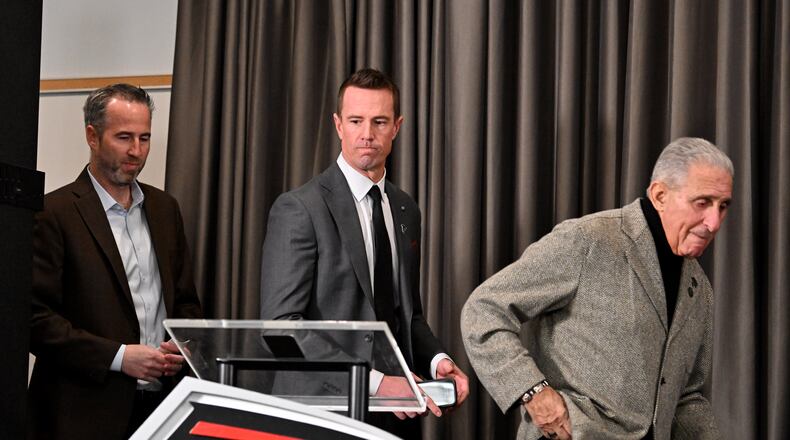 Former Atlanta Falcons quarterback Matt Ryan and Arthur M. Blank arrive for a news conference to introduce Ryan as the Falcons’ new president of football, Tuesday, Jan. 13, 2026, in Flowery Branch. (Hyosub Shin/AJC)