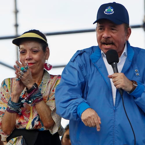 FILE - Nicaragua's President Daniel Ortega speaks to supporters as his wife and Vice President Rosario Murillo applauds, in Managua, Nicaragua, Aug. 29, 2018. (AP Photo/Alfredo Zuniga, File)