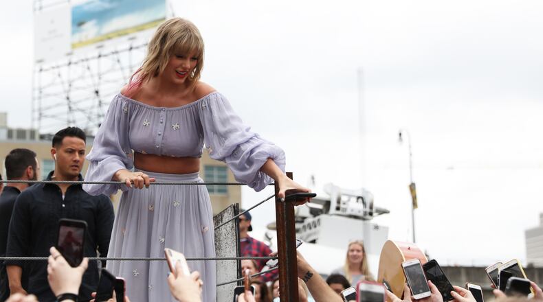In advance of her new album release, Taylor Swift surprises fans at the new Kelsey Montague "What Lifts You Up" Mural on April 25, 2019 in Nashville, Tennessee. Swift commissioned the mural and put clues about her upcoming new music in the piece. (Photo by Leah Puttkammer/Getty Images)