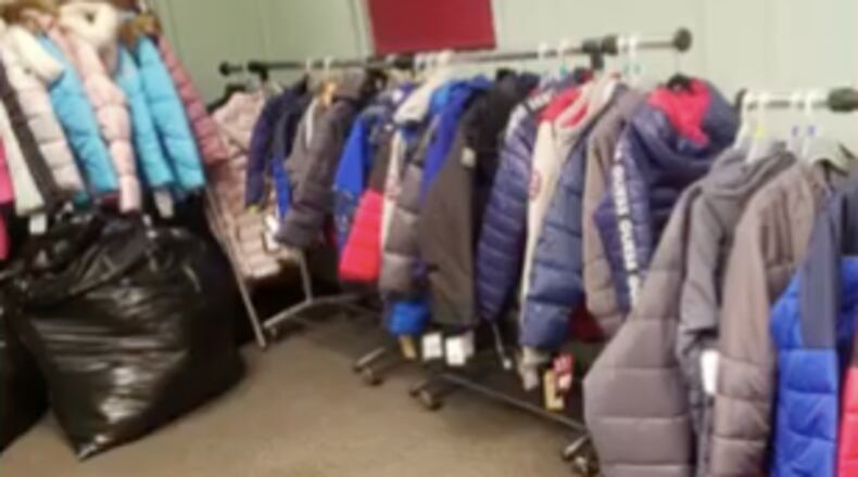 The gifts were donated by community members and were intended to be given to students at John Lewis Invictus Academy.