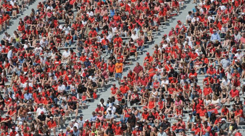Over 10,000 football fans sit and watch the Black Team vs the Red Team during the UGA Spring football Football Game in Sanford Stadium at the University of Georgia on Saturday, April 14,2012. The Red team won 32 to 31.