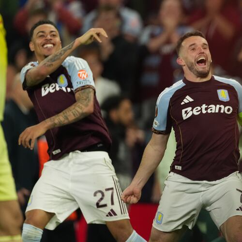 Aston Villa's John McGinn, right, and Morgan Rogers react after the Europa League second-leg semifinal soccer match between Aston Villa and Nottingham Forest in Birmingham, England, Thursday, May 7, 2026. (AP Photo/Dave Shopland)
