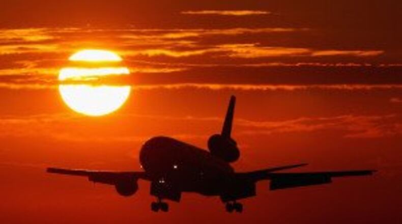 A plane comes in for a landing at Miami International Airport. (Getty Images)