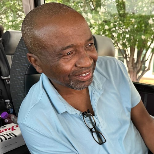 Keith Odom, a forklift driver from Aiken, S.C., looks out from his bus seat as he arrives in Montgomery, Ala., for a voting rights rally Saturday, May 16, 2026. (AP Photo/Bill Barrow)