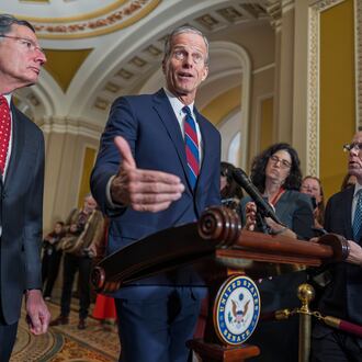 Senate Majority Leader John Thune, R-S.D., joined at left by Sen. John Barrasso, R-Wyo., speaks to reporters after a closed-door meeting with fellow Republicans, at the Capitol in Washington, Tuesday, Dec. 9, 2025. (AP Photo/J. Scott Applewhite)