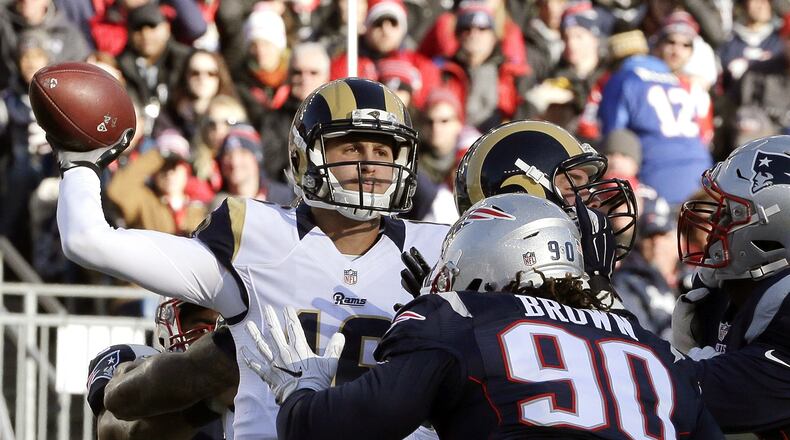 FILE - In this Sunday, Dec. 4, 2016 file photo, Los Angeles Rams quarterback Jared Goff (16) passes over New England Patriots defensive lineman Malcom Brown (90) during the first half of an NFL football game in Foxborough, Mass. When Jared Goff was preparing to become the No. 1 pick in the NFL draft earlier this year, many scouts and observers compared him to Matt Ryan, the veteran quarterback of the Atlanta Falcons. (AP Photo/Steven Senne, File)