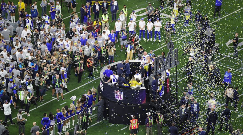 The Los Angeles Rams accept the Vince Lombardi Trophy as winners of Super Bowl LVI, at SoFi Stadium in Inglewood, Calif., Feb. 13, 2022. (Meg Oliphant/The New York Times)