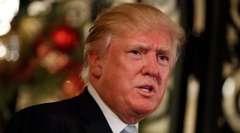President-elect Donald Trump speaks to reporters at Mar-a-Lago, Wednesday, Dec. 28, 2016, in Palm Beach, Fla. (AP Photo/Evan Vucci)