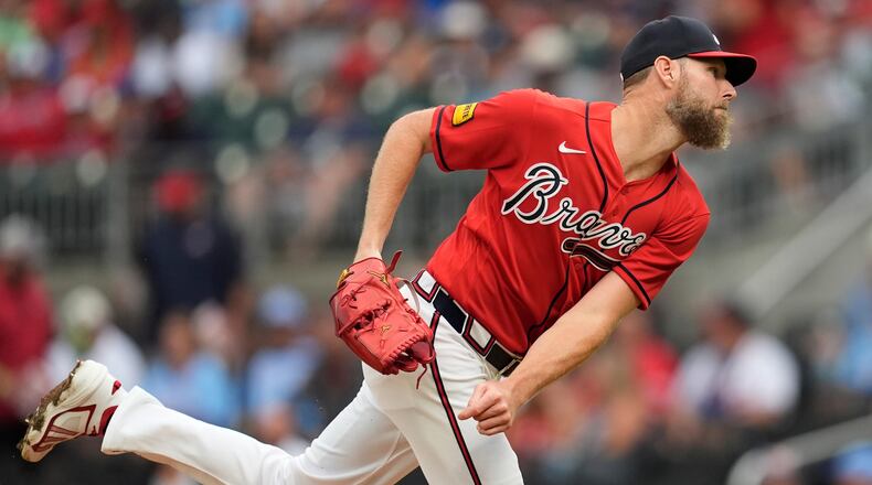 Atlanta Braves pitcher Chris Sale (51) works in the first inning of a baseball game against the Texas Rangers, Friday, July 17, 2026, in Atlanta. (AP Photo/Mike Stewart)